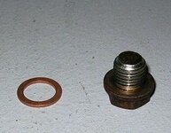 1359889380_odevaem-prokladku-na-slivnoy-bolt-chevrolet-lacetti.jpg